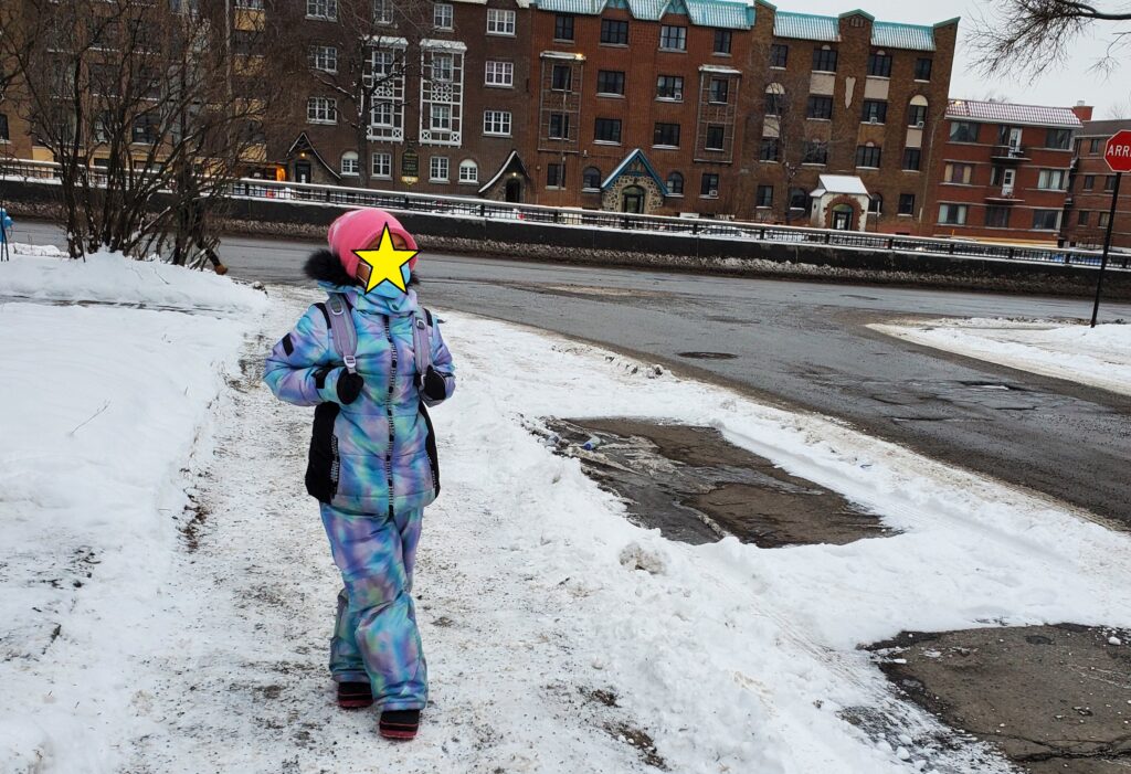 A girl walking on snow